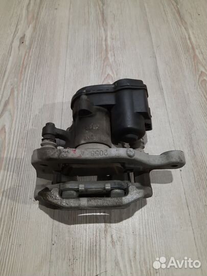 Суппорт тормозной задний Nissan qashqai J10 Лев