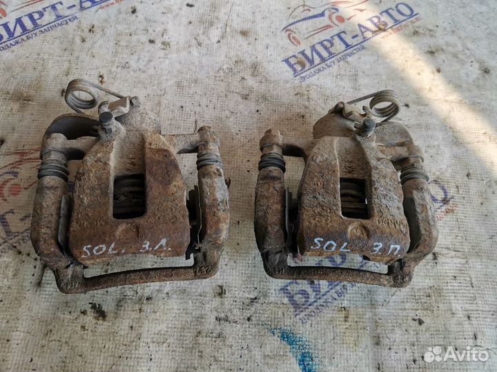 Суппорт тормозной задний левый Hyundai Solaris I