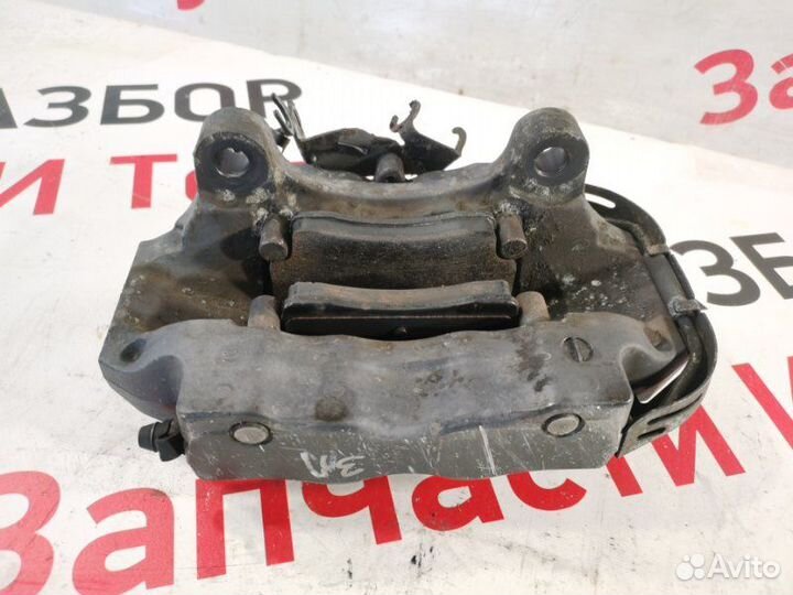 Суппорт тормозной задний левый Audi Q7 внедорожник