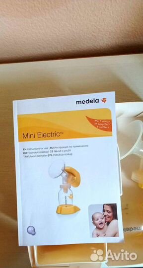 Молокоотсос medela электрический
