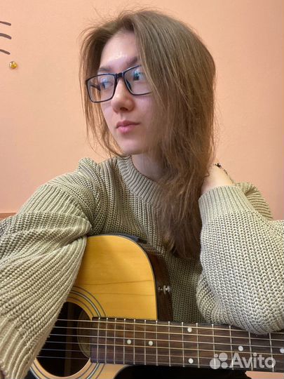 Учитель гитары и укулеле