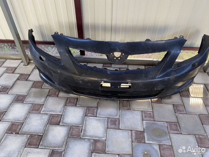 Бампер Toyota Corolla e150