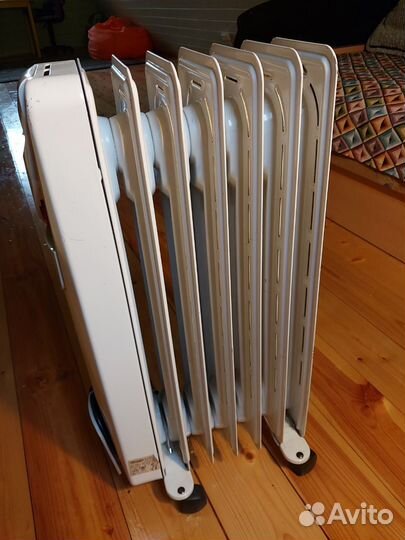 Масляный обогреватель Delonghi