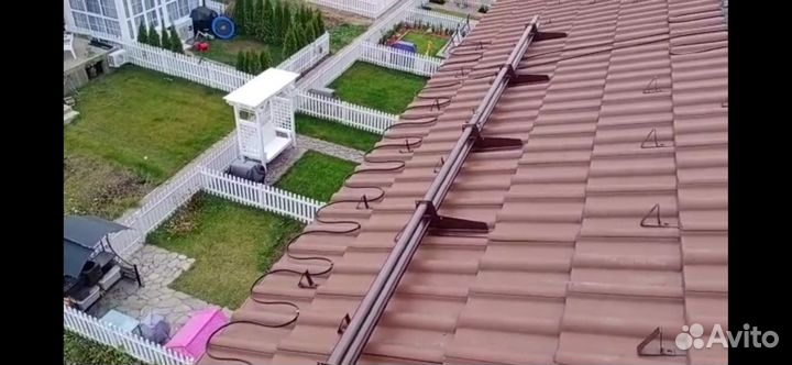 Монтаж греющего кабеля и гирлянд на кровлю и фасад