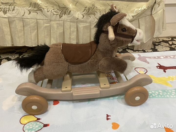 Детская каталка лошадь