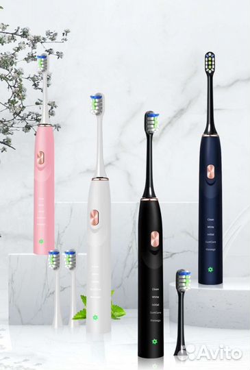 Электрическая зубная щетка