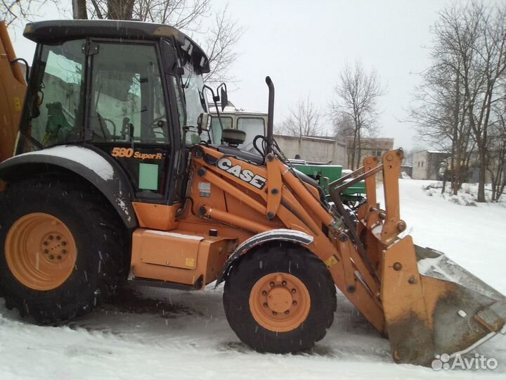 Услуги экскаватора-погрузчика