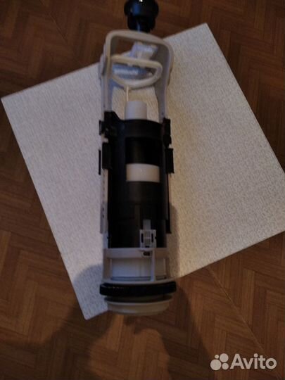 Сливной механизм для унитаза