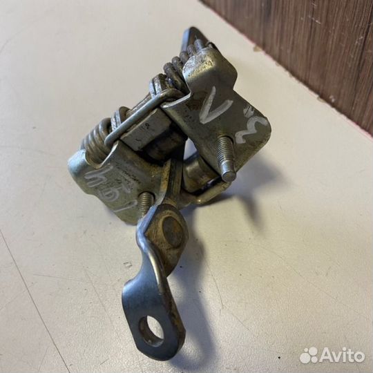 Ограничитель двери задний левый Renault Logan