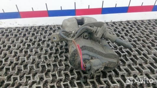 Суппорт тормозной задний правый volkswagen passat