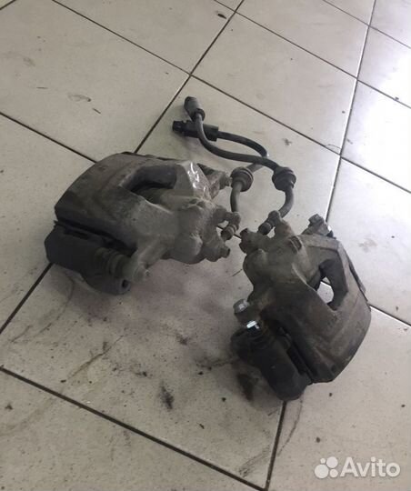 Суппорт передний левый Chevrolet Cruze