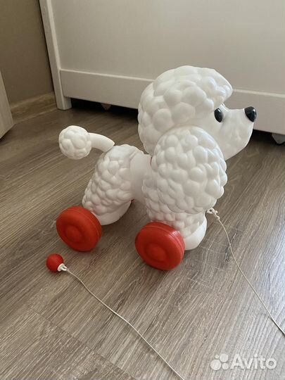 Игрушка каталка