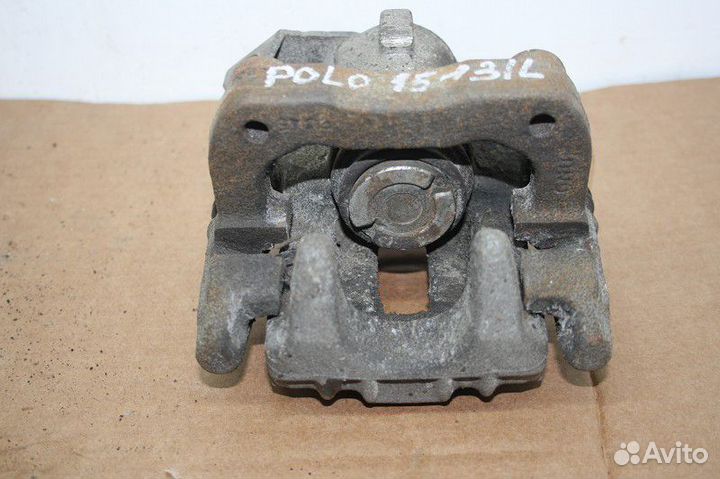 Суппорт задний левый Volkswagen polo (SED) 2011