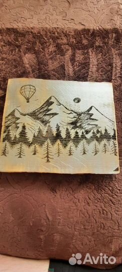 Вызженое изображение на слебе