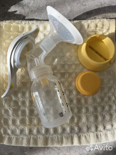 Молокоотсос medela ручной