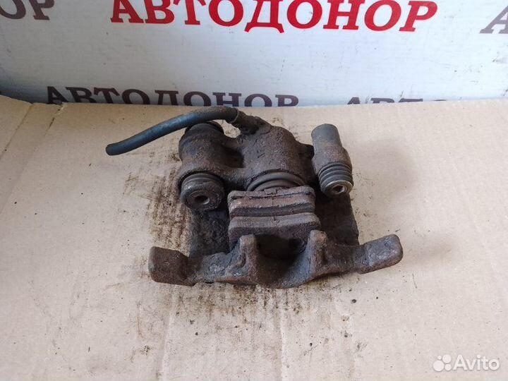 Суппорт тормозной задний левый Peugeot 605