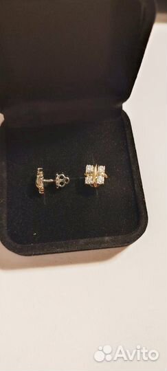 Золотые серьги с изумрудами