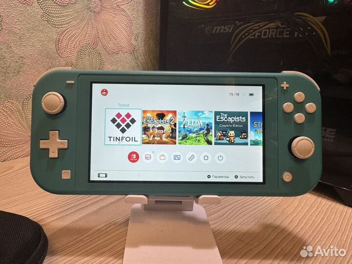 Nintendo switch lite прошитая + игры