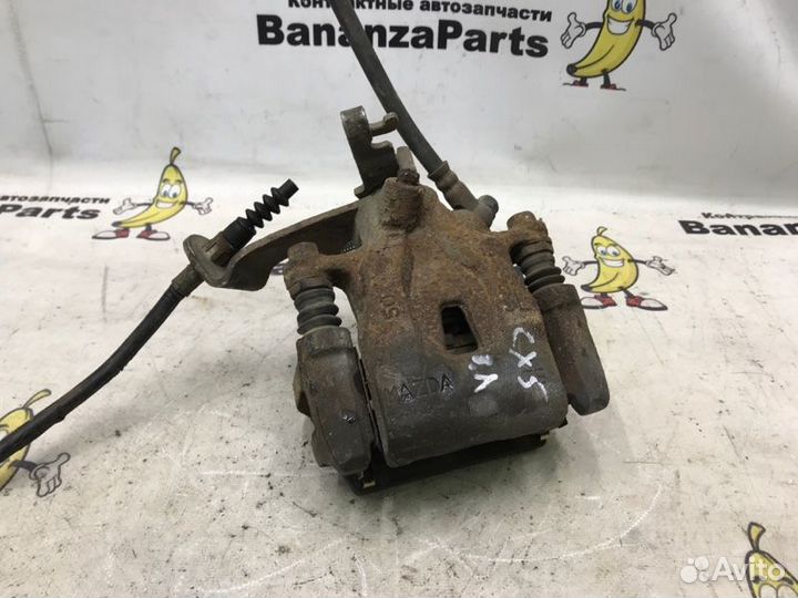 Суппорт тормозной задний левый Mazda Cx-5 KE