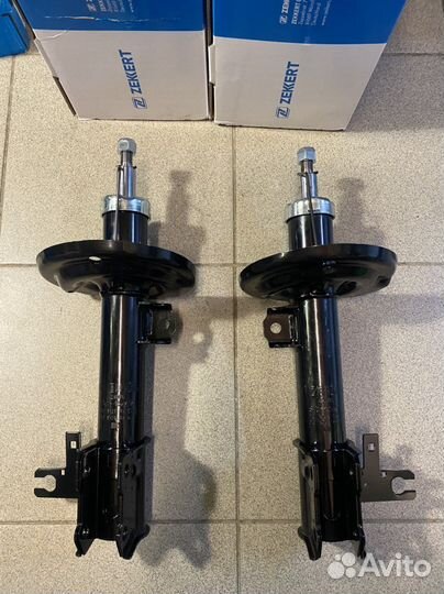 Амортизатор передний Opel Astra H