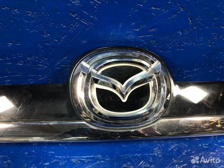 Накладка крышки багажника задняя Mazda Cx-7 ER
