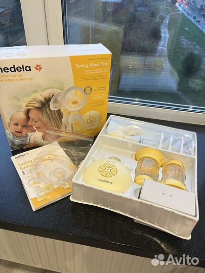 Молокоотсос medela swing maxi flex