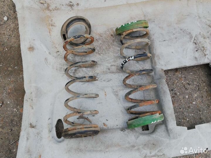 Пружина задняя Мазда 3 вк