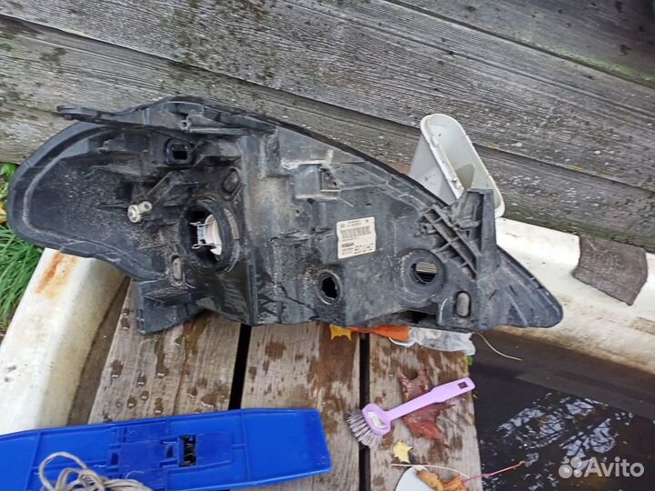 Фара левая nissan tiida 26060EM00A