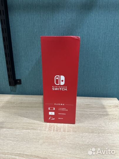 Nintendo Switch oled красно-синяя, 64 гб. Новая