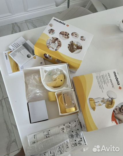 Молокоотсос medela электрический