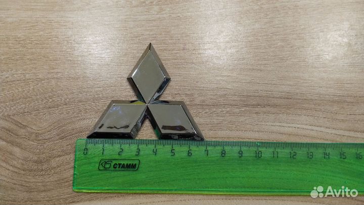 Эмблема mitsubishi