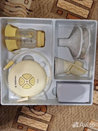 Молокоотсос medela swing flex