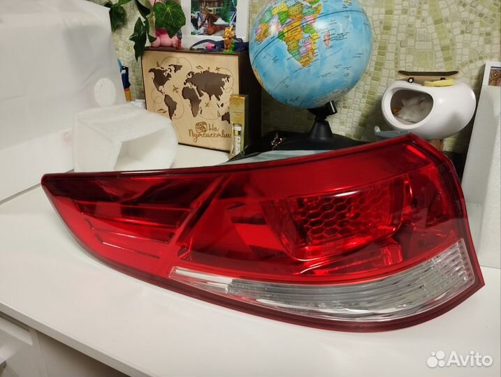 Фонарь задний левый