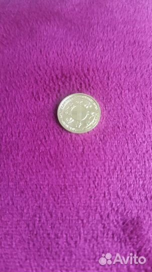 Золотая монета Казахстан