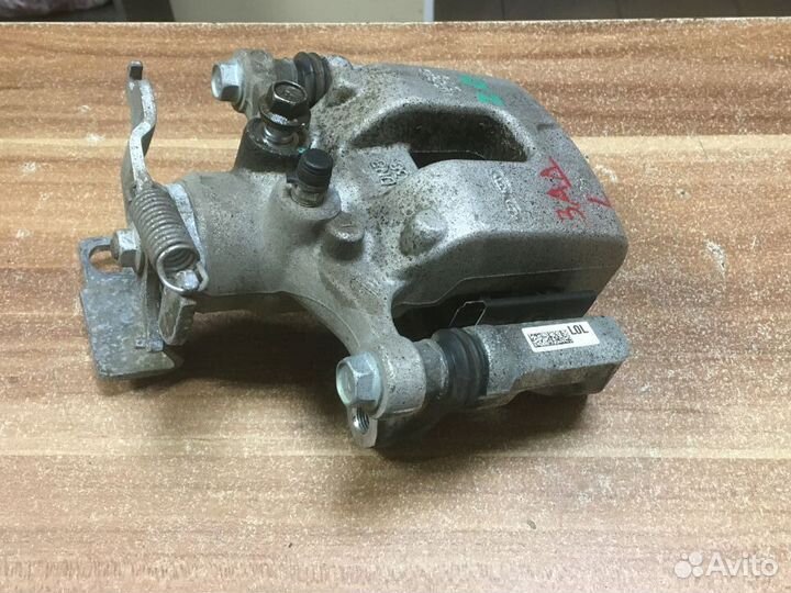 Суппорт задний левый Kia K5