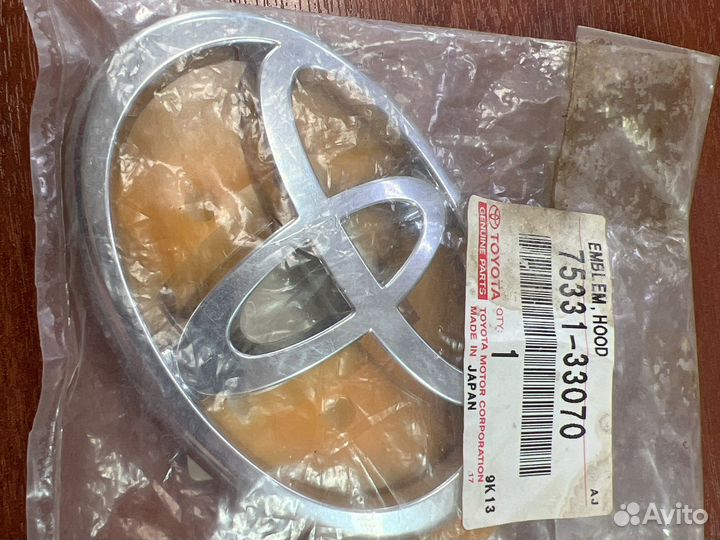 Эмблема Тайота