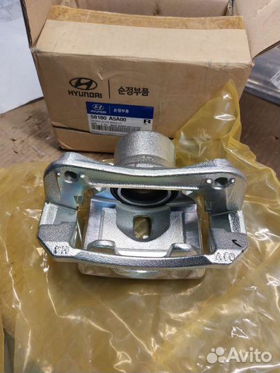 Суппорт передний левый Hyundai I30/Elantra новый