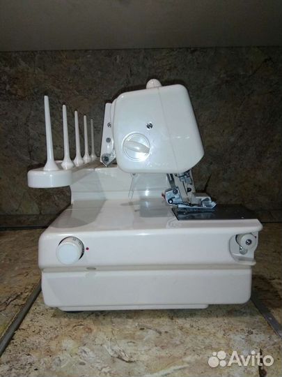 Каверлок. Распошивальная Машина