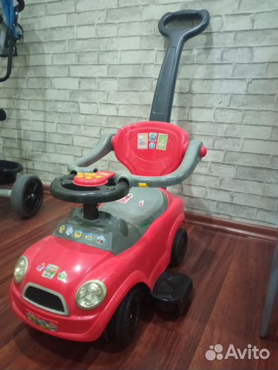 Детская машинка каталка с ручкой