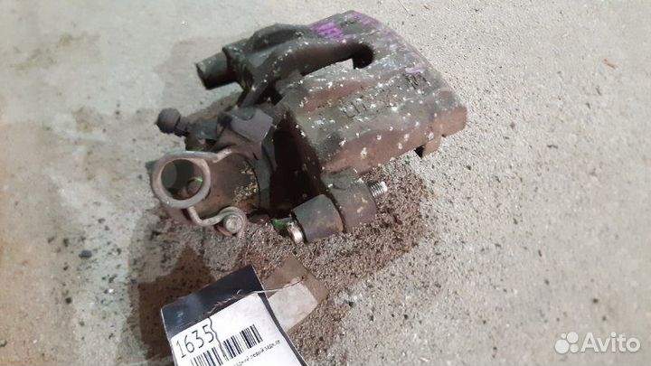 Суппорт тормозной задний левый задний левый Ford