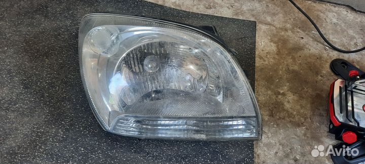 Фара kia sportage 921011f0