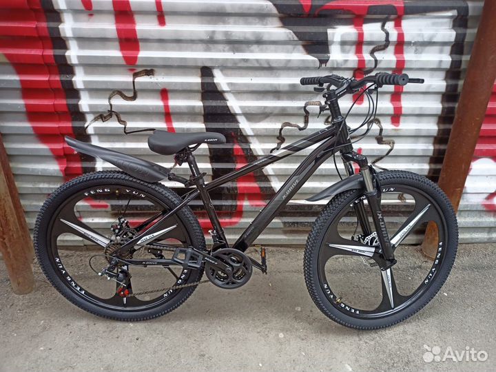 Велосипед на литых дисках 26