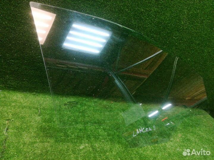 Стекло двери переднее правое Ssang Yong Actyon