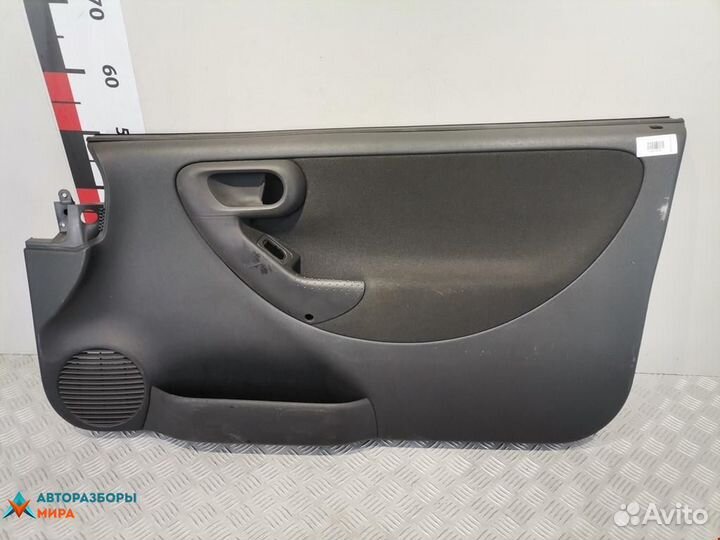 Обшивка двери передняя правая Opel Corsa C рест