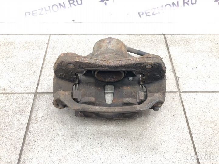 Суппорт тормозной передний левый Kia Ceed хэтчбек