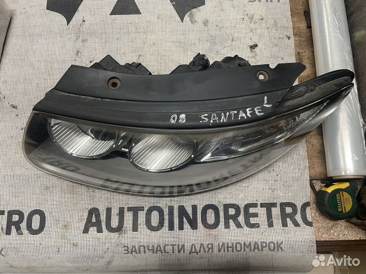 Фара левая Hyundai Santa Fe 921012bxxx