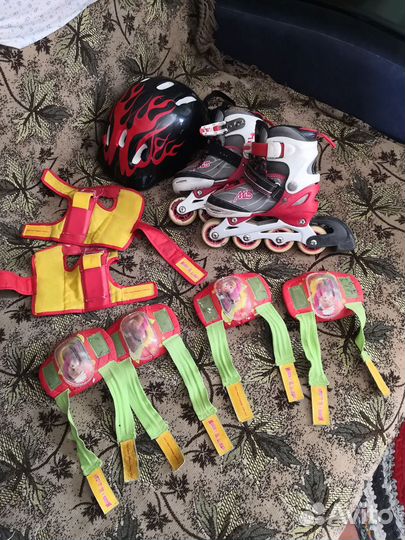 Роликовые коньки