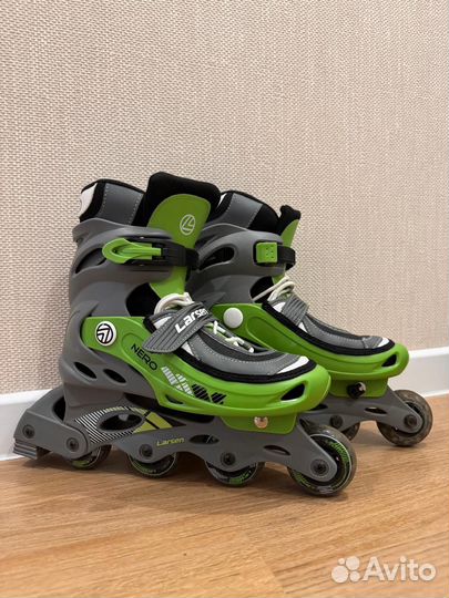 Роликовые коньки