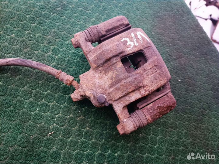 Суппорт задний левый Дэу Магнус 2002 г