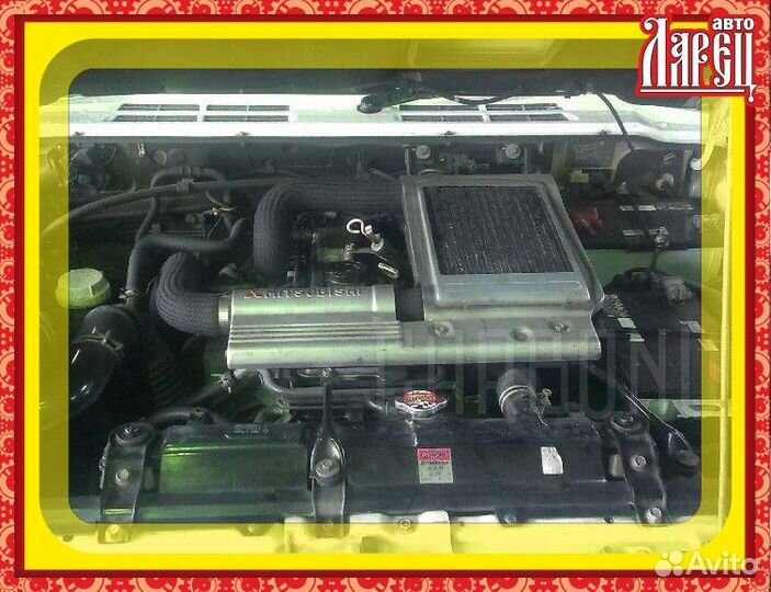 Тросик стояночного тормоза Mitsubishi Pajero